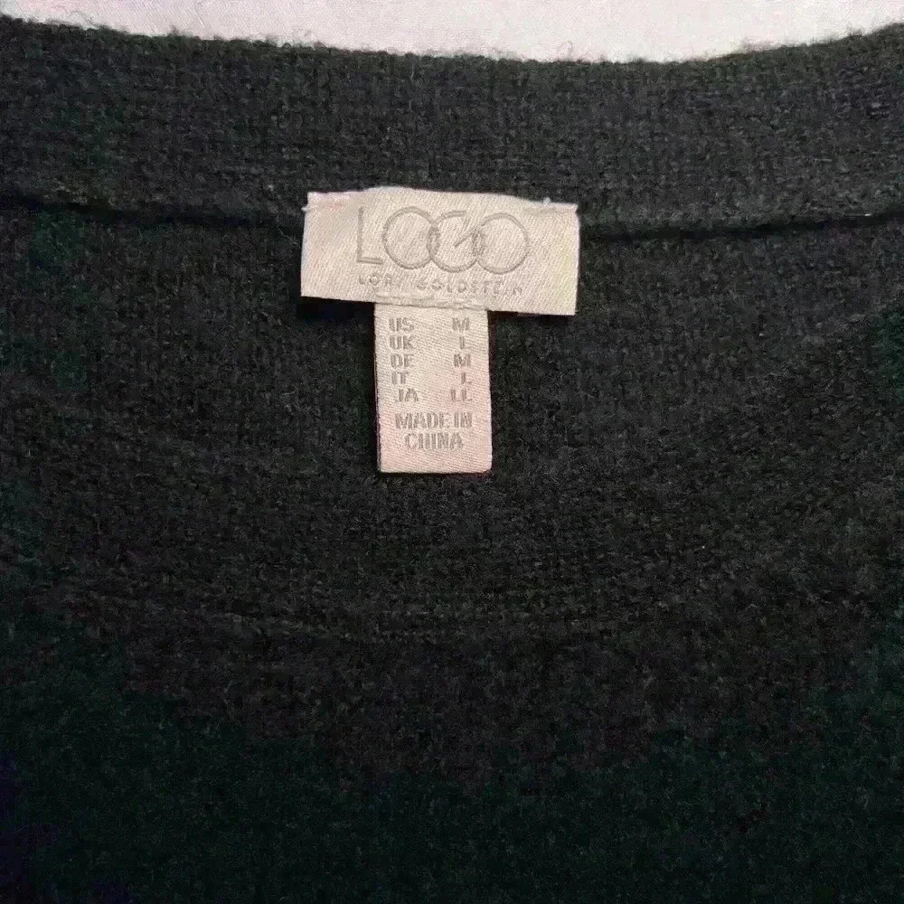 Logo by Lori Goldstein black texture sweater